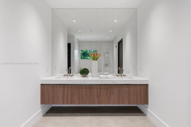 11150 Griffing Blvd, Biscayne Park, FL 33161 - bathroom featuring a stall shower, double vanity, baseboards, and recessed lighting