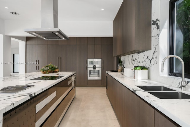 11150 Griffing Blvd, Biscayne Park, FL 33161 - kitchen featuring island range hood, modern cabinets, a sink, black electric cooktop, and dark brown cabinets