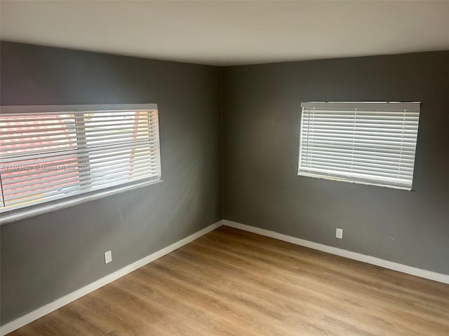 empty room with light wood-type flooring