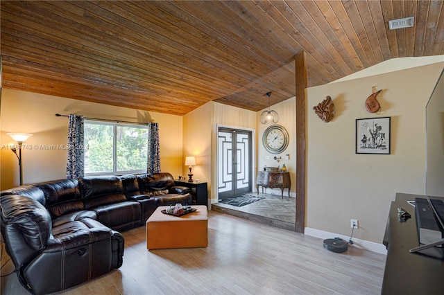 living room with wooden ceiling, wood-type flooring, and lofted ceiling