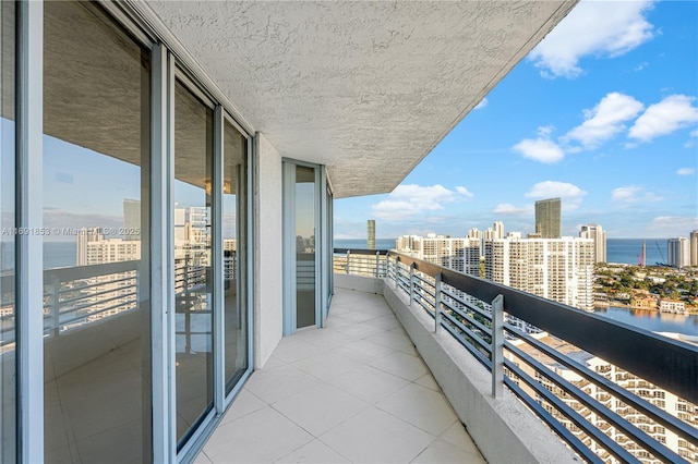 balcony featuring a water view