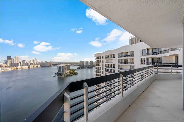 balcony featuring a water view