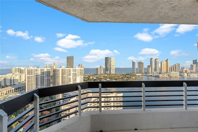 balcony featuring a water view