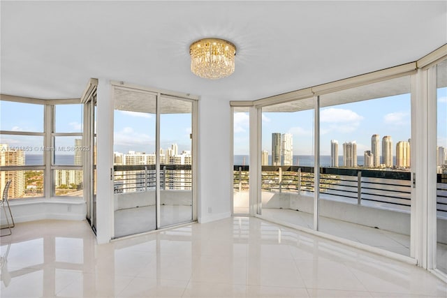 sunroom with a notable chandelier