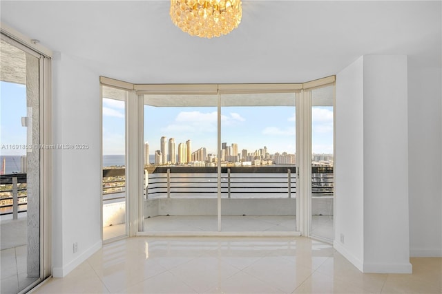 interior space featuring an inviting chandelier and a healthy amount of sunlight