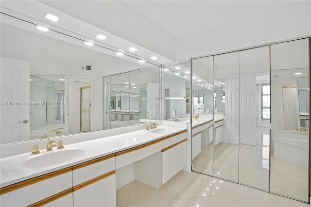 bathroom featuring tile patterned floors and vanity