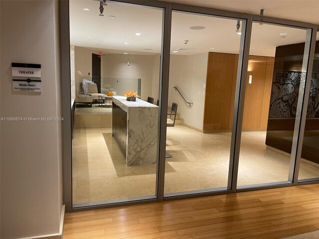 entryway with light hardwood / wood-style flooring