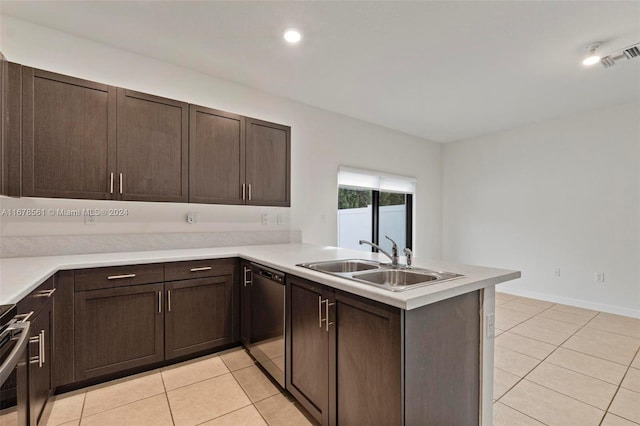 kitchen featuring stainless steel dishwasher, kitchen peninsula, sink, and light tile patterned floors