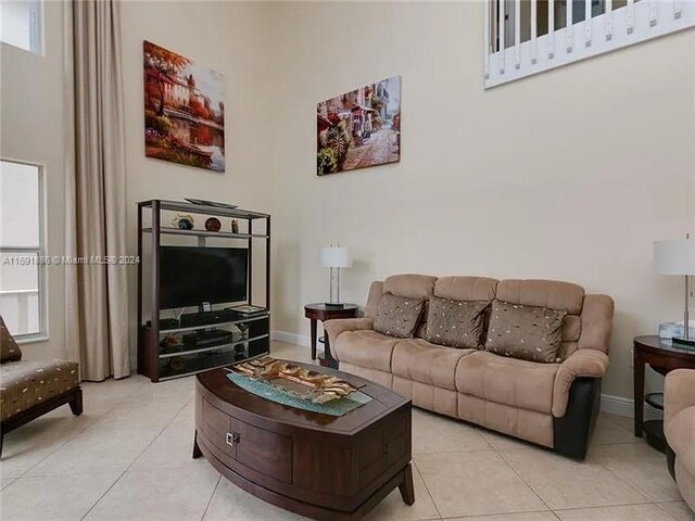 living room featuring light tile patterned floors