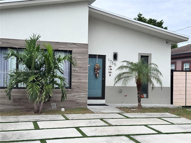 doorway to property featuring a patio