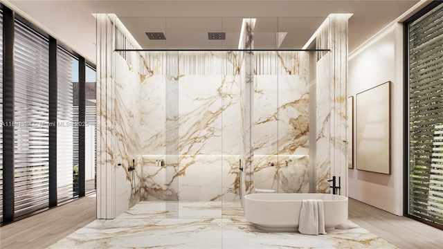 bathroom featuring tile walls and separate shower and tub