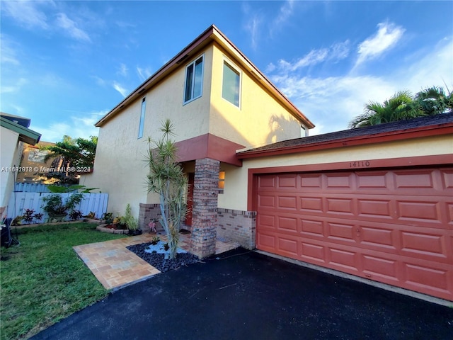 view of front of property with a front lawn