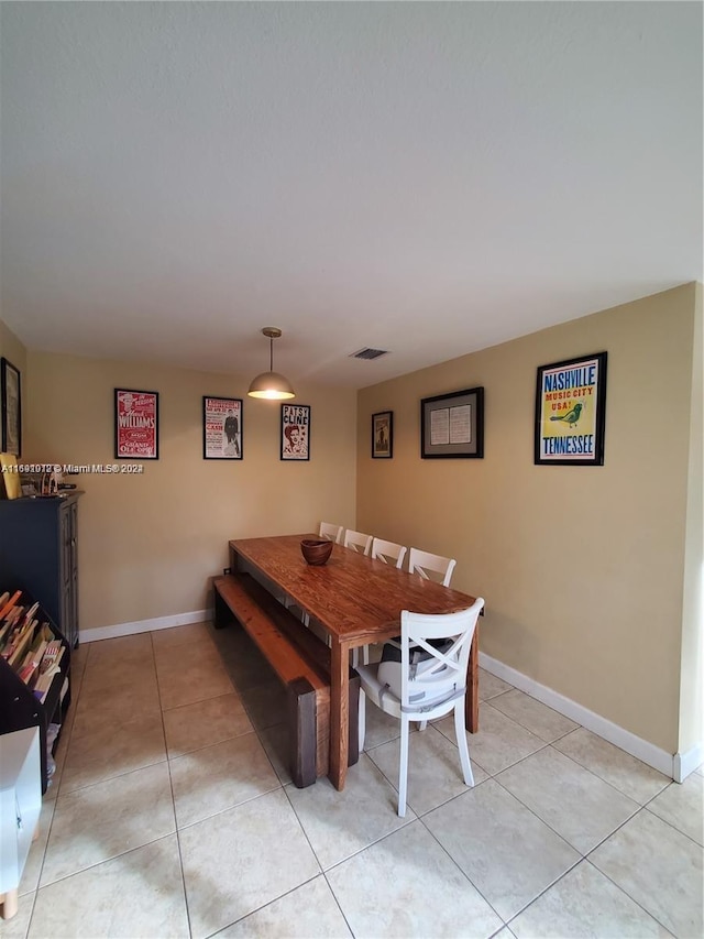 dining room with light tile patterned floors