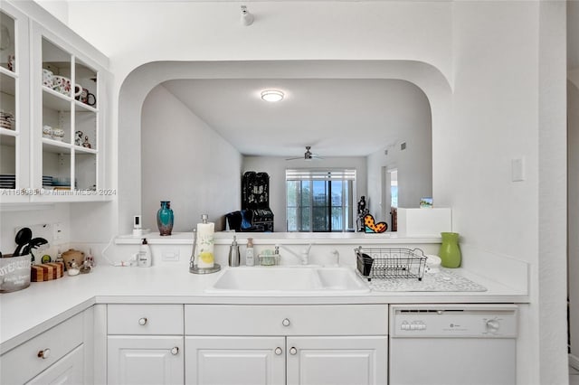 kitchen with white cabinetry, sink, white dishwasher, and ceiling fan