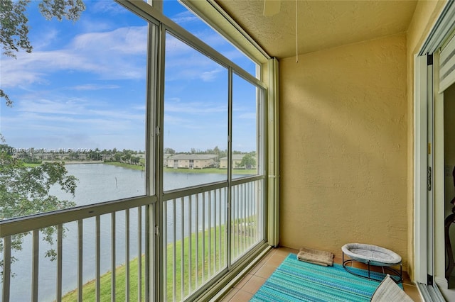 sunroom with a water view