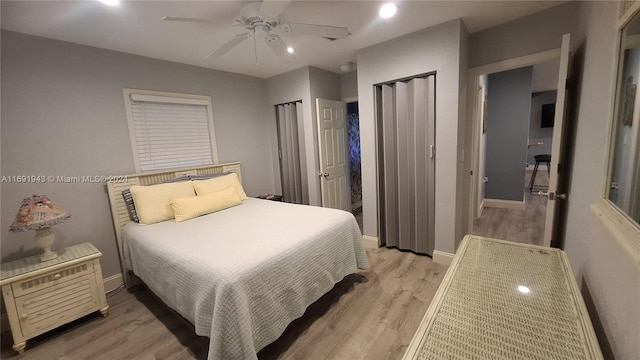 bedroom featuring ceiling fan and light hardwood / wood-style flooring