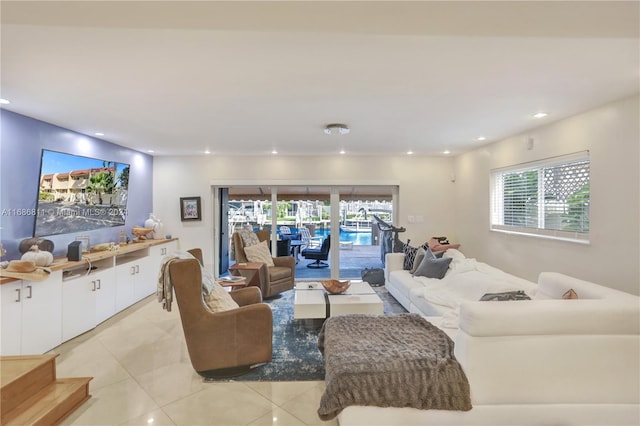 tiled living room featuring plenty of natural light