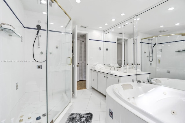 bathroom with vanity, tile patterned floors, and separate shower and tub