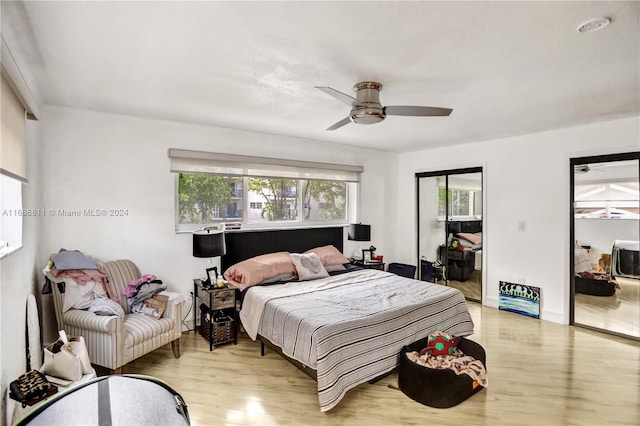 bedroom featuring ceiling fan, a closet, and light hardwood / wood-style flooring