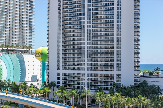 view of building exterior with a water view