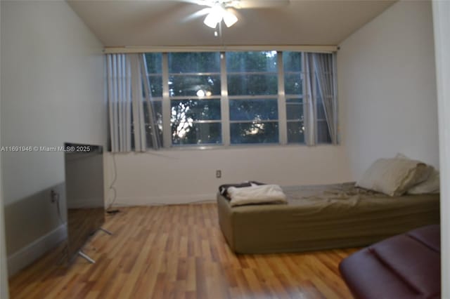 interior space featuring ceiling fan and hardwood / wood-style floors