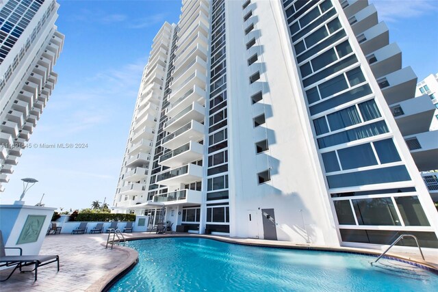 2715 N Ocean Blvd Unit 3A, Fort Lauderdale, FL 33308 - community pool featuring a patio