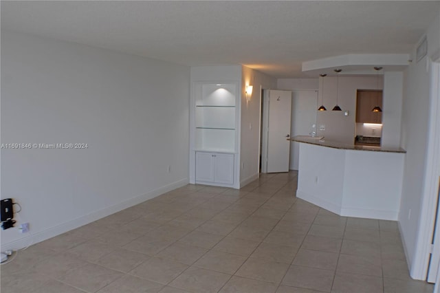 interior space with light tile patterned floors