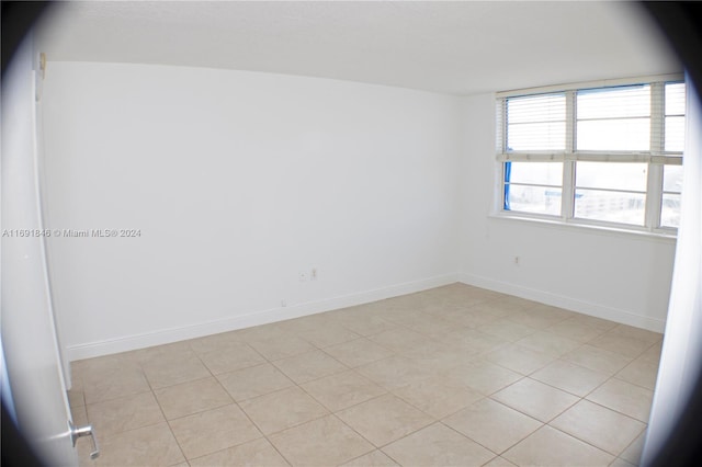 view of tiled spare room