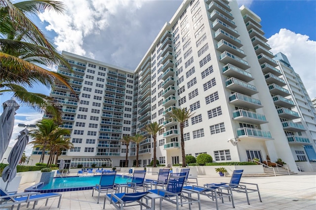 view of pool featuring a patio