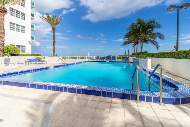 view of pool featuring a patio area