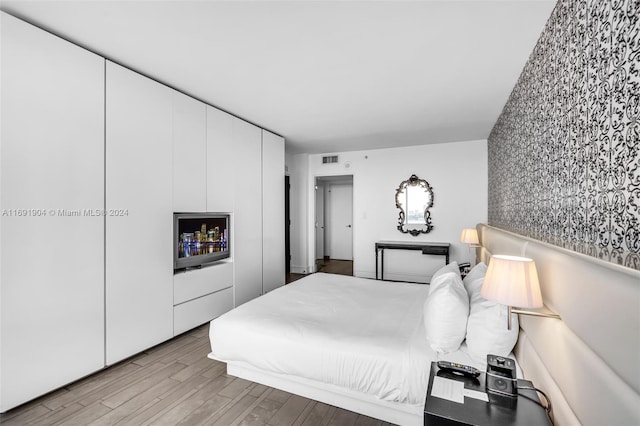 bedroom featuring light wood-type flooring