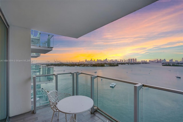 view of balcony at dusk