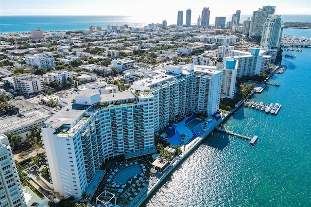 birds eye view of property featuring a water view