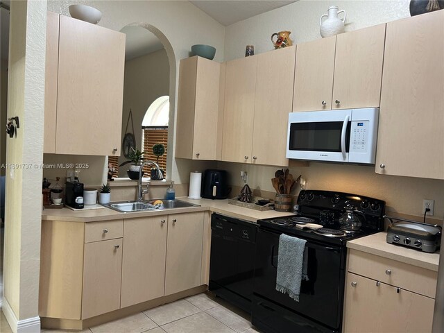 full bathroom featuring tile patterned flooring, tiled shower / bath combo, toilet, and vanity