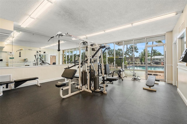 gym with a textured ceiling