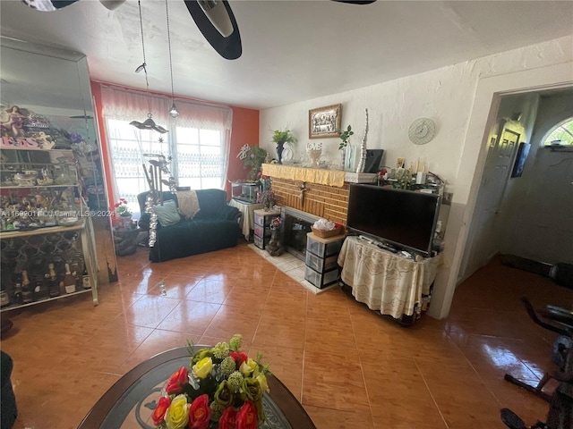 living room with tile patterned floors