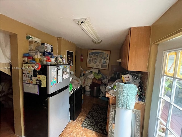 kitchen with stainless steel refrigerator