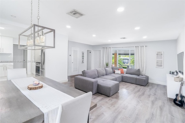 living room featuring light hardwood / wood-style flooring