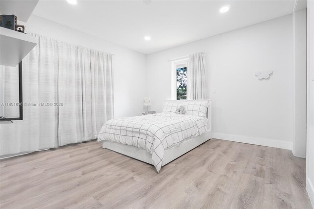 bedroom featuring light hardwood / wood-style flooring