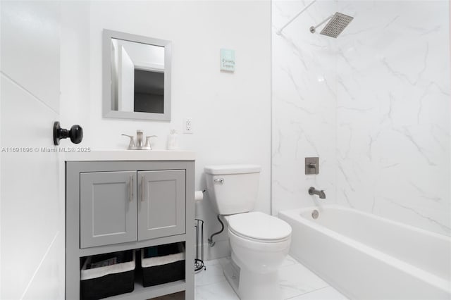 full bathroom featuring vanity, tiled shower / bath combo, and toilet