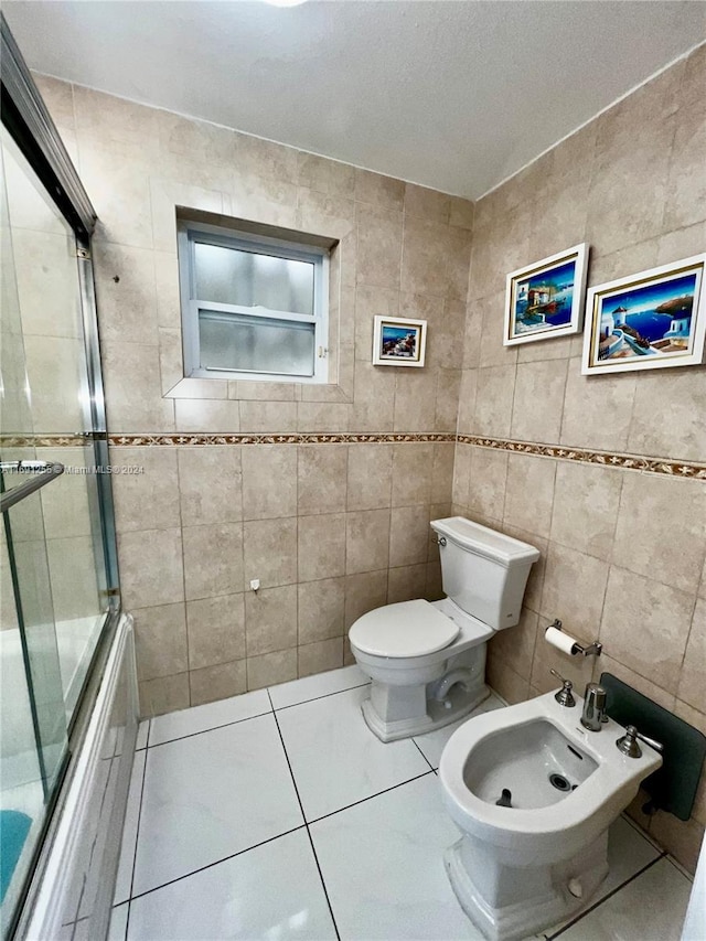 bathroom featuring tile patterned floors and tile walls