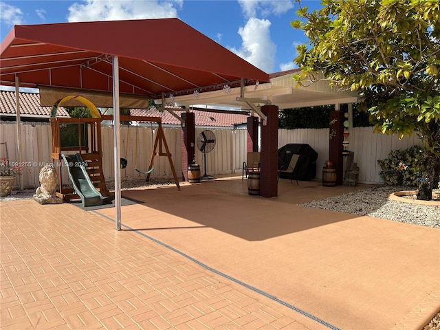 view of patio / terrace featuring a playground