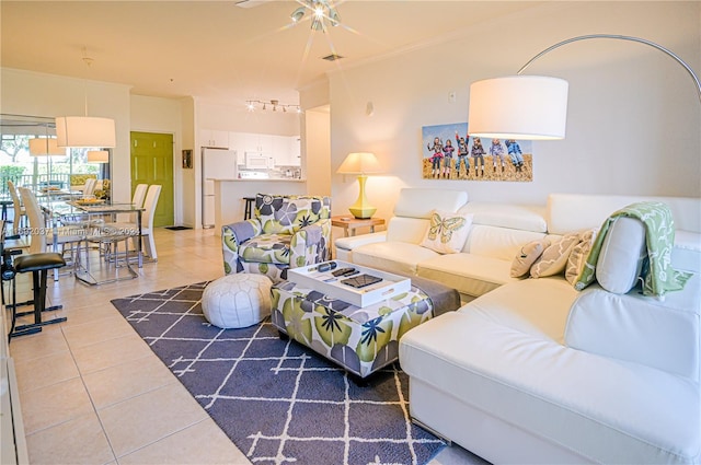 living room with tile patterned floors