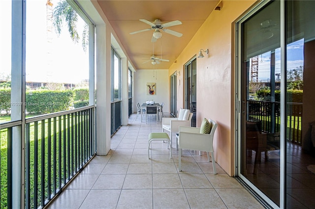 balcony featuring ceiling fan