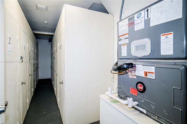 utility room with heating unit