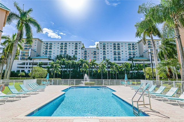 view of swimming pool with a patio