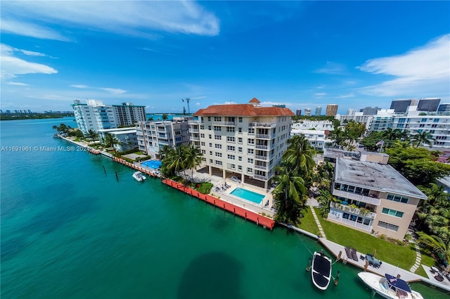 drone / aerial view with a water view