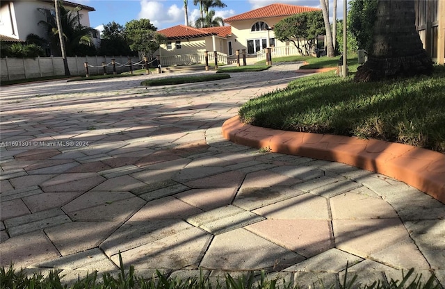 view of home's community featuring a patio area