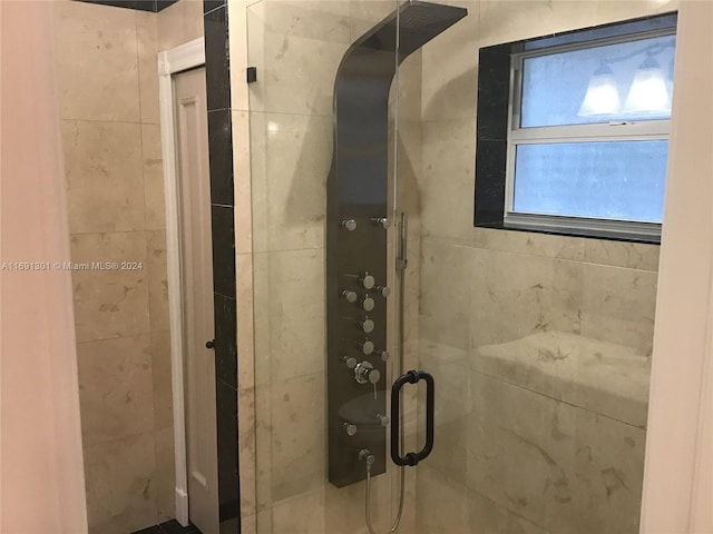 bathroom featuring walk in shower