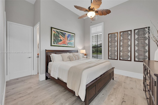 bedroom featuring light hardwood / wood-style flooring and ceiling fan